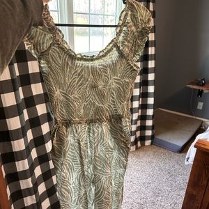 Super cute pants romper. New with Tags.
